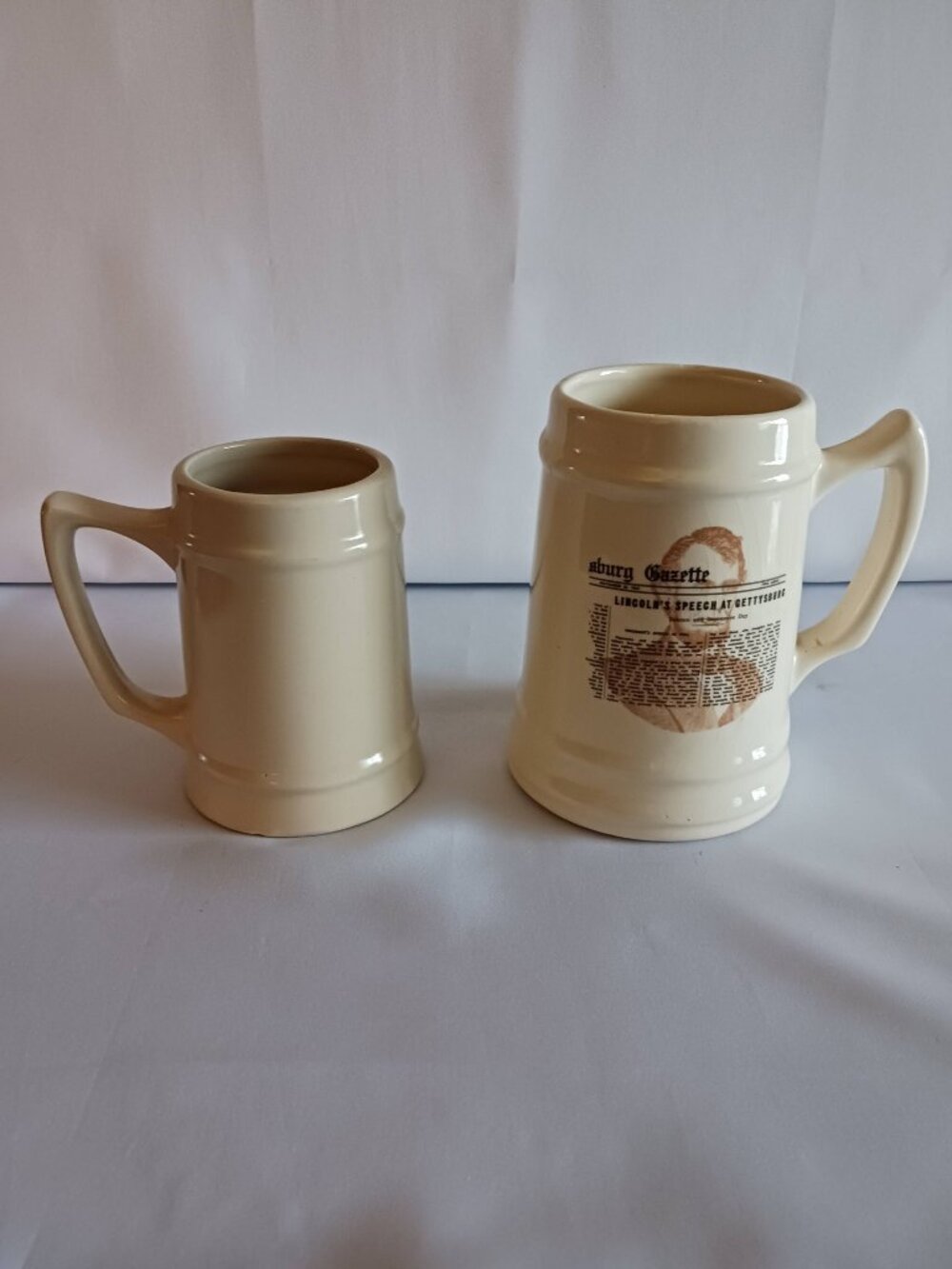 Lot of 2 Bisque Color Porcelain Mugs